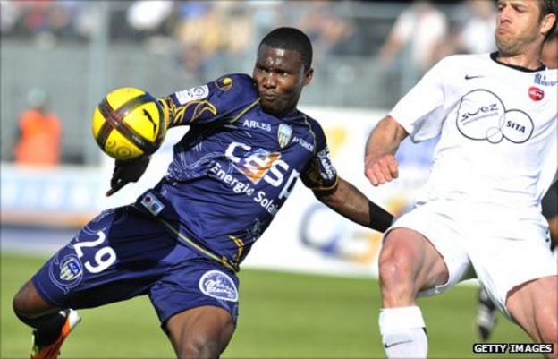 Ivorian striker Franck Dja Djedje (left)
