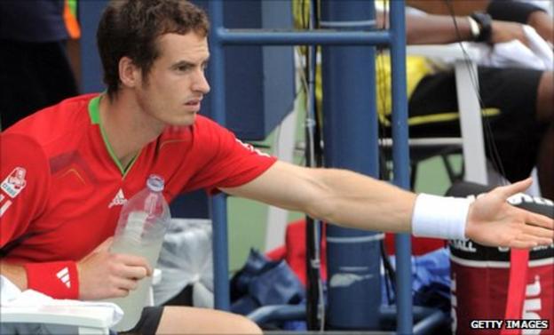 Andy Murray and match officials discuss the state of the court