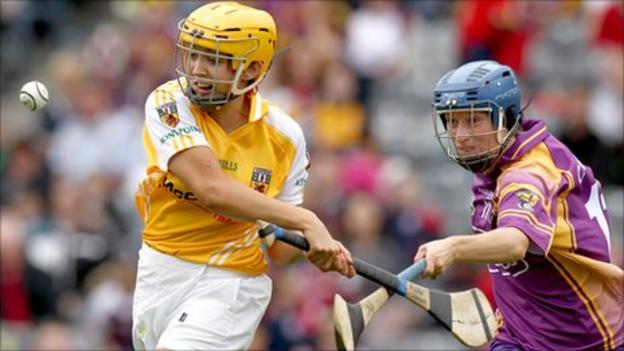 Antrim's Aileen Martin is challenged by Wexford opponent Bridget Curran at Croke Park