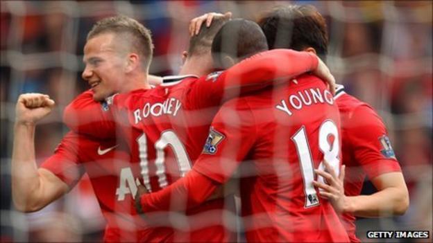 Cleverley, Rooney and Young celebrate
