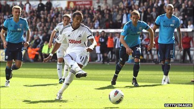 Winger Scott Sinclair fires home from the penalty spot for Swansea's first Premier League goal