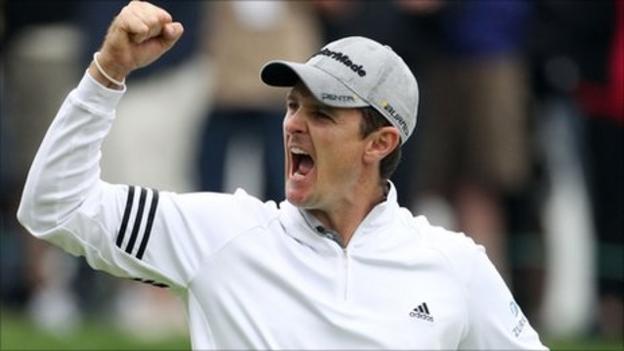Justin Rose celebrates after sinking the winning putt on the 18th green