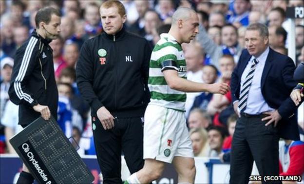 Scott Brown trudges off during Celtic's defeat at Ibrox