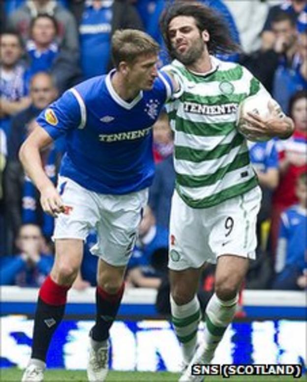 Celtic's Georgios Samaras (right) clashes with Dorin Goian