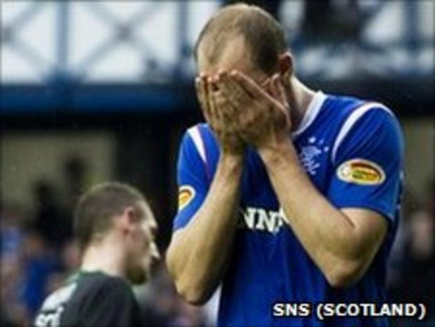 Steven Whittaker holds his head in his hands after missing a penalty for Rangers against Hibernian