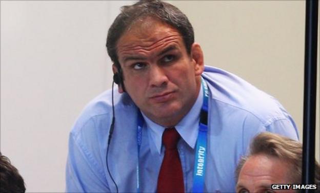 Martin Johnson watches on as England crash out of the World Cup