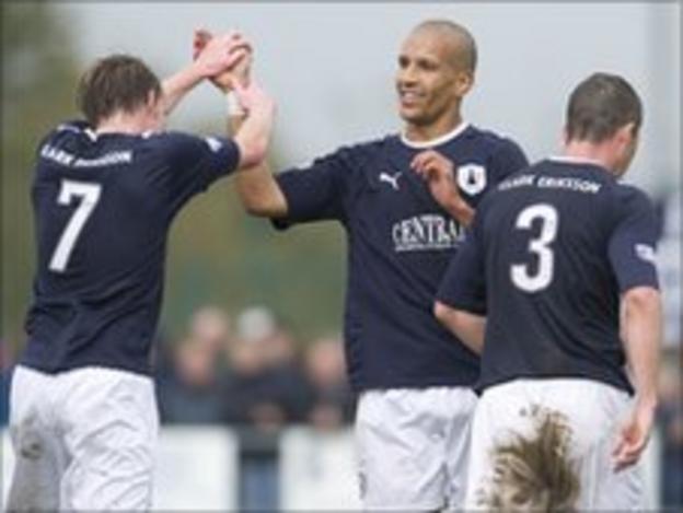 Farid El Alagui celebrates with his team-mates after scoring for Falkirk against Annan Athletic