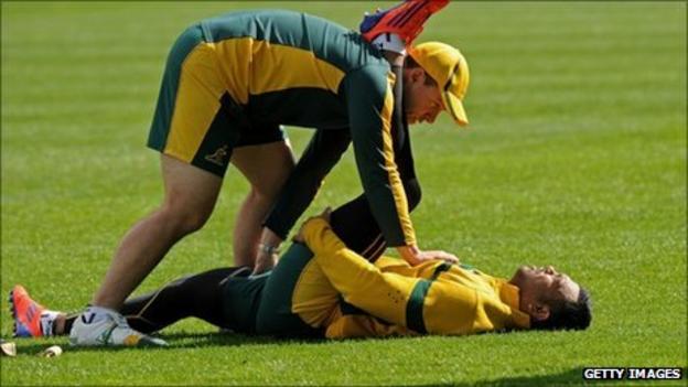 Australia's Kurtley Beale has his troublesome left hamstring stretched in training