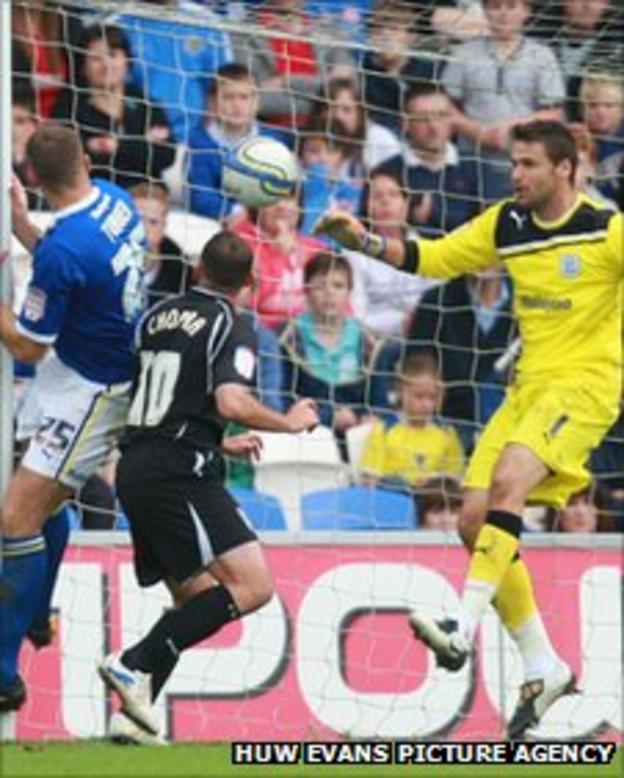 Ipswich striker Michael Chopra heads in at the far post