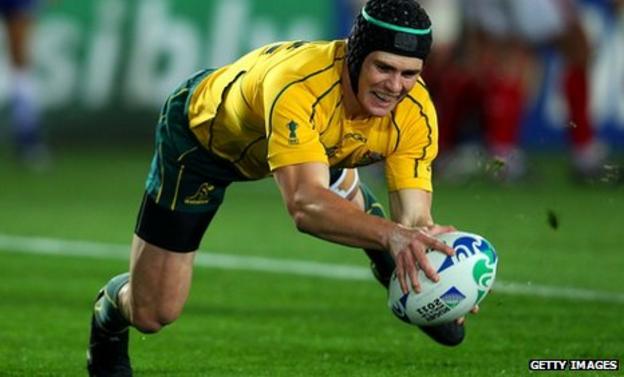 Berrick Barnes touches down for Australia's opening try