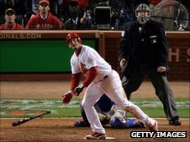 St. Louis Cardinals Lance Berkman tages back at first against