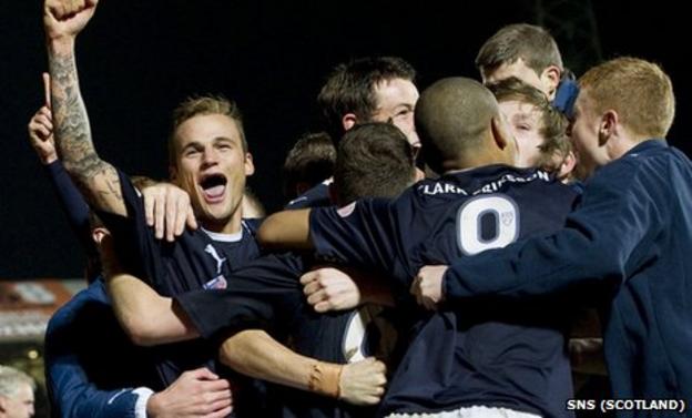 Falkirk celebrate their League Cup win at Tannadice