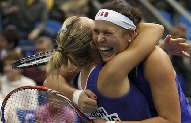 The Czech Republic's Lucie Hradecka (right) and Kveta Peschke react after defeating Russia's Elena Vesnina and Maria Kirilenko in the Fed Cup final