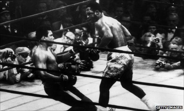 Joe Frazier floors Muhammad Ali in their first fight in New York