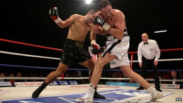 Neven Pajkic and Tyson Fury during their Commonwealth heavyweight title fight in Manchester