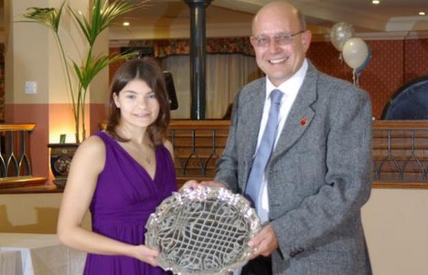 Samantha Godel gets her award from JSAD chairman Paul Patterson