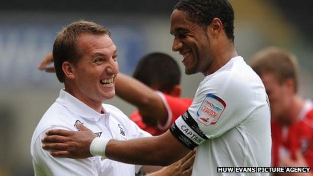 Brendan Rodgers with Ashley Williams