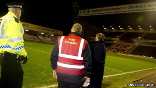 Police and stewards at Fir Park