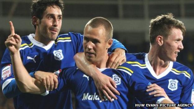 Kenny Miller (centre) celebrates with Peter Whittingham and Joe Mason