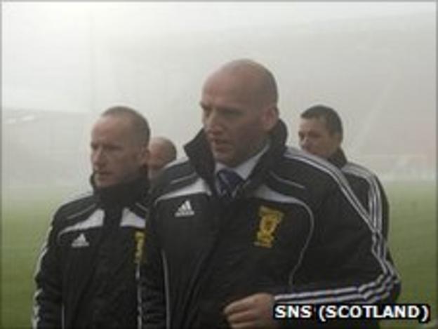 Referee Bobby Madden and his assistants