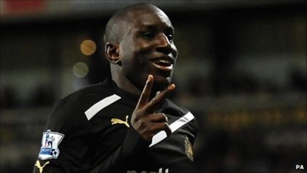 Demba Ba celebrates scoring Newcastle's second goal at Bolton
