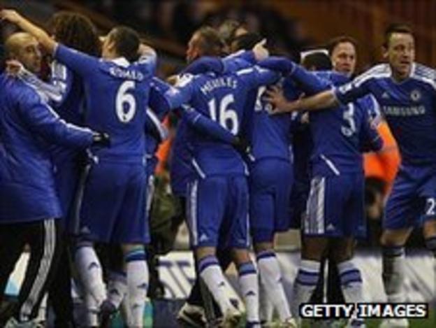 Chelsea players celebrate their opening goal by Ramires