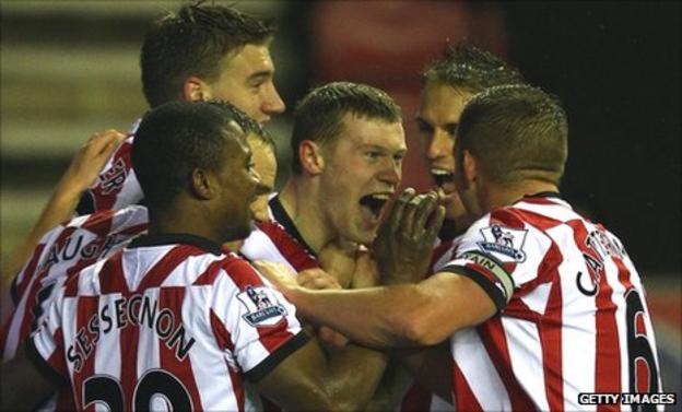 James McClean celebrates with team-mates after his Sunderland goal