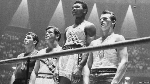 Muhammad Ali, then known as Cassius Clay, wins Olympic gold in Rome