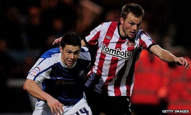 Sebastian Larsson (right) challenges with Tommy Rowe
