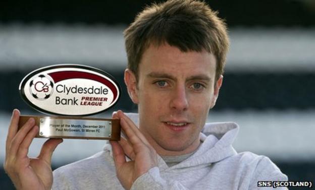 Paul McGowan shows off his player of the month award