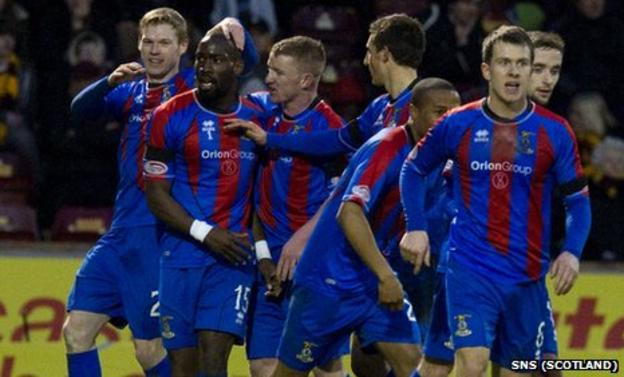 Gregory Tade celebrates with his Inverness team-mates after scoring against Motherwell