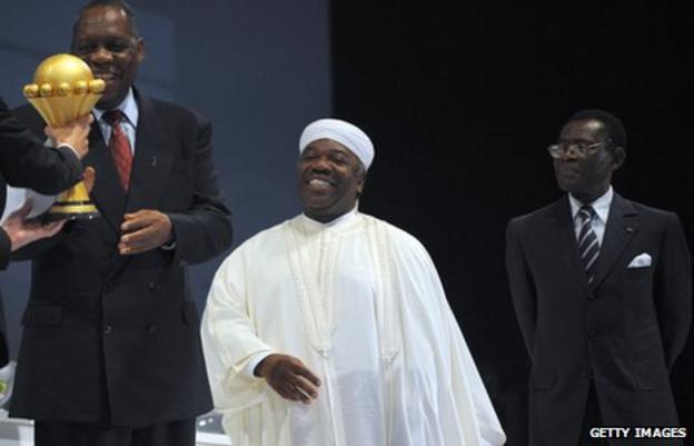 Caf President Issa Ayatou (L), Gabonese President Ali Bongo (C) and Equatorial Guinea President Teodoro Obiang Nguema (R)