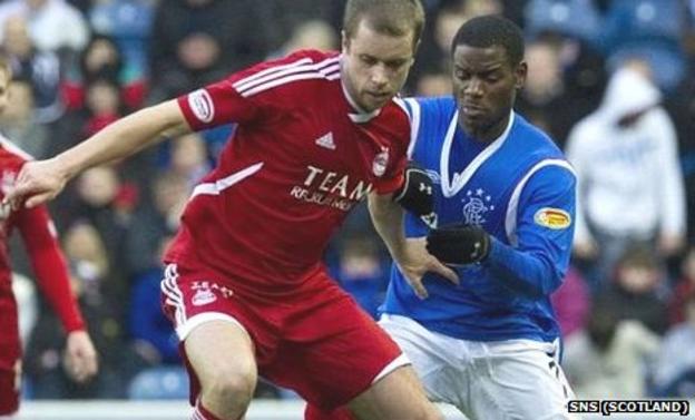 Aberdeen's Kari Arnason and Rangers Maurice Edu