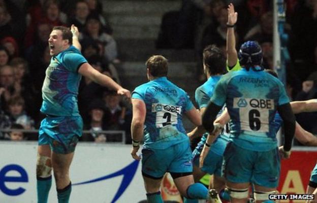 Brett Sturgess celebrates his try against Perpignan