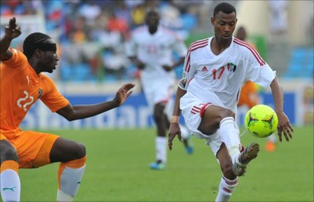 Sol Bamba (left) vies for possession with Sudan's Mudathir