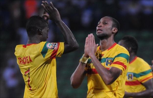 Abdou Traore and Seydou Keita (right)