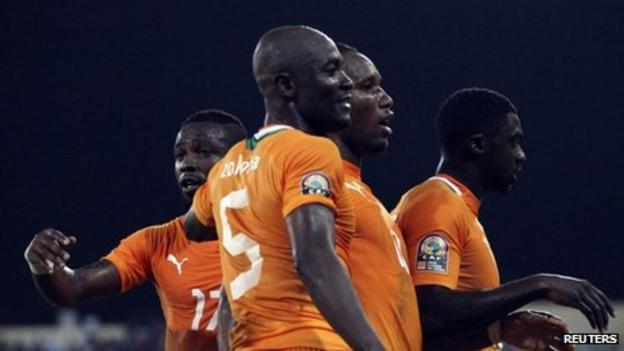 Ivory Coast players celebrate scoring against Burkina Faso