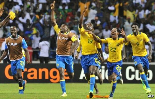 Gabon players celebrate their dramatic win over Morocco