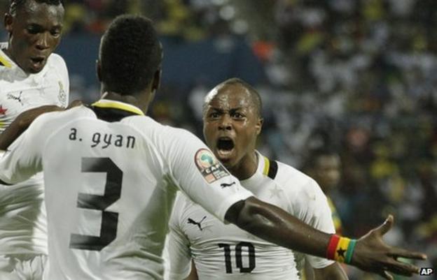 Dede Ayew and Asamoah Gyan celebrate scoring against Mali