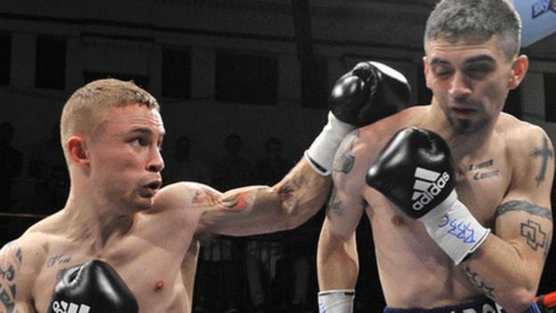 Carl Frampton throws a punch against Kris Hughes in the London fight