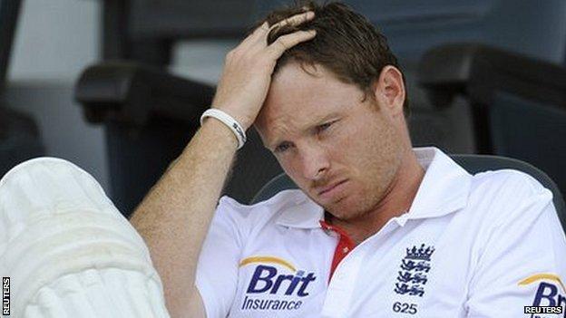 Ian Bell holds his head
