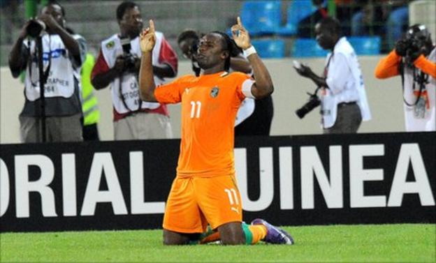 Didier Drogba celebrates scoring in Ivory Coast's 3-0 win over co-hosts Equatorial Guinea