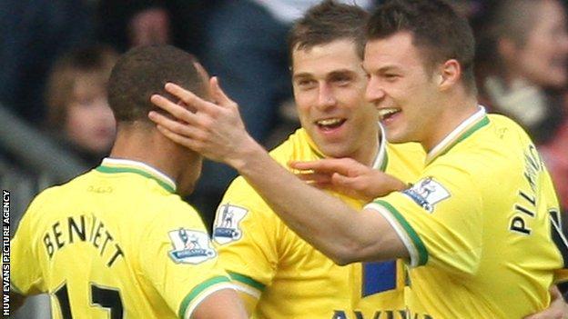 Norwich's Anthony Pilkington (right) celebrates with Grant Holt and Elliott Bennett after scoring their second goal