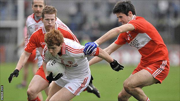 Tyrone's Peter Harte is challenged by Chrissy McKaigue of Derry at Healy Park