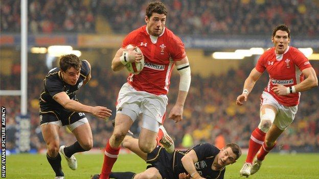 Wales wing Alex Cuthbert breaks through against Scotland for his first Test try