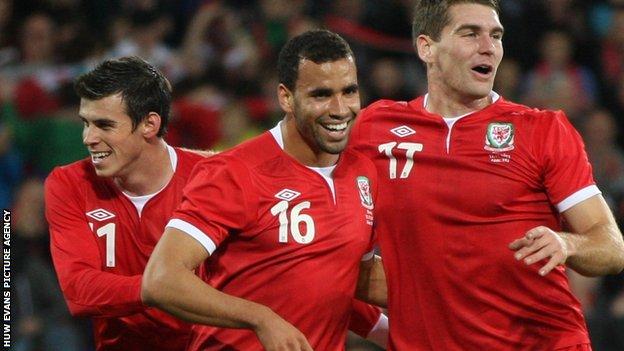 Gareth Bale, Hal Robson-Kanu and Sam Vokes celebrate victory over Norway