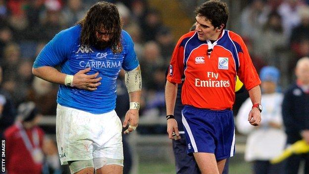 Martin Castrogiovanni is taken off after breaking a rib against England