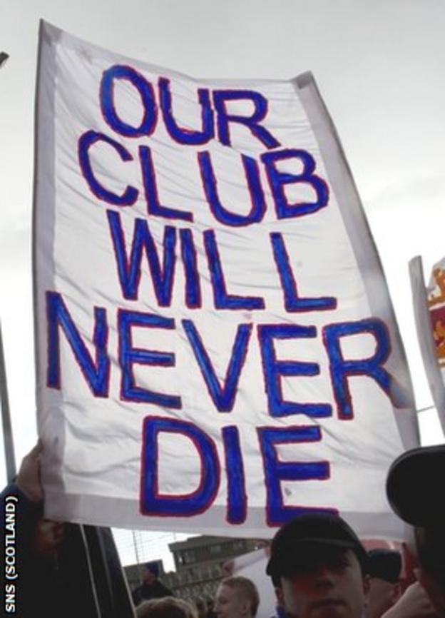 Rangers fans display a banner