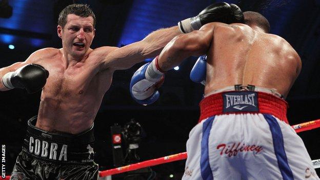 Britain's Carl Froch (left) in action against Andre Ward