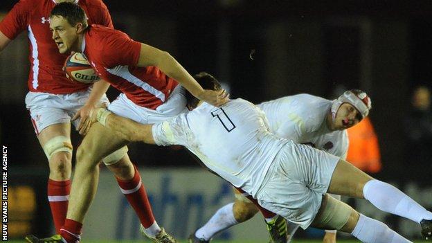 Wales' Cory Allen is tackled by England's Luke Cowan-Dickie